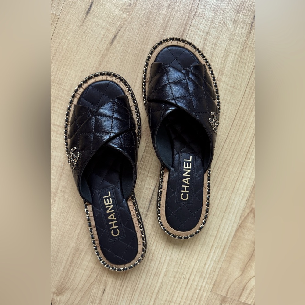 Chanel 24S Mules. Size: 36 1/2. Color: Black with gold chains.